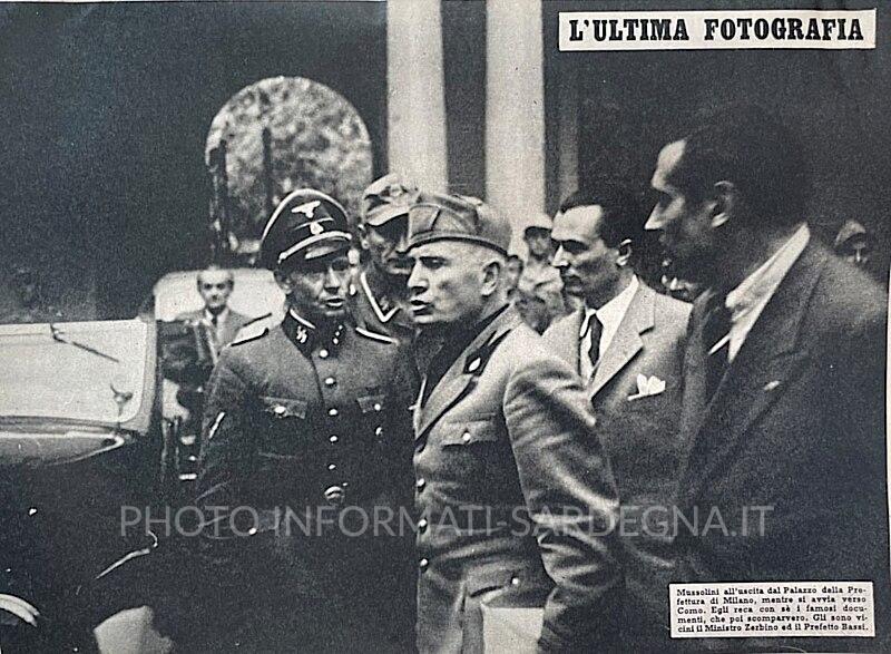 Ultima foto di Mussolini vivo. Il 25 aprile 1945 abbandona la prefettura di Milano scortato dalle SS. 